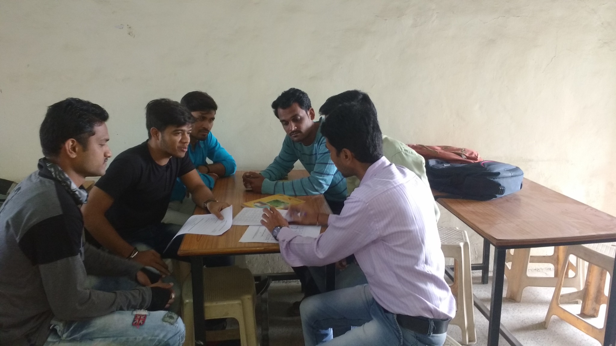 M.A. students receiving research project and dissertation guidance