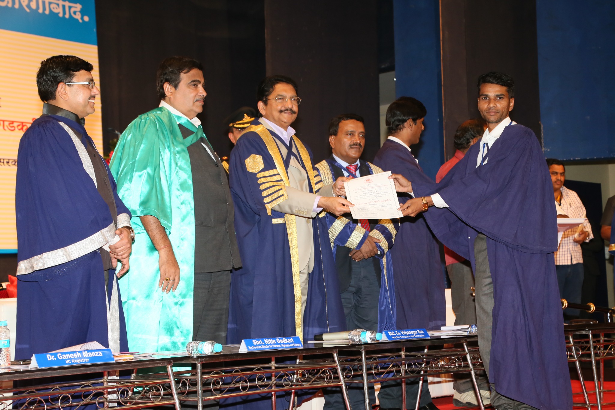 Receiving PhD Degree at the 55th Convocation